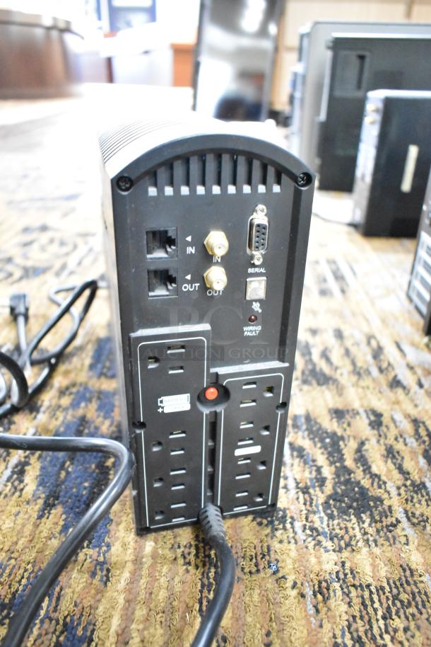 CyberPower 1350VA Intelligent LCD UPS with multiple outlets and input/output ports, model and wiring fault indicators visible.