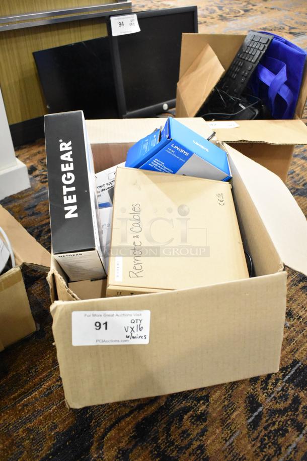 Box of 16 items including Netgear switch, Linksys box, with visible keyboard, monitor, and cables in mixed condition.