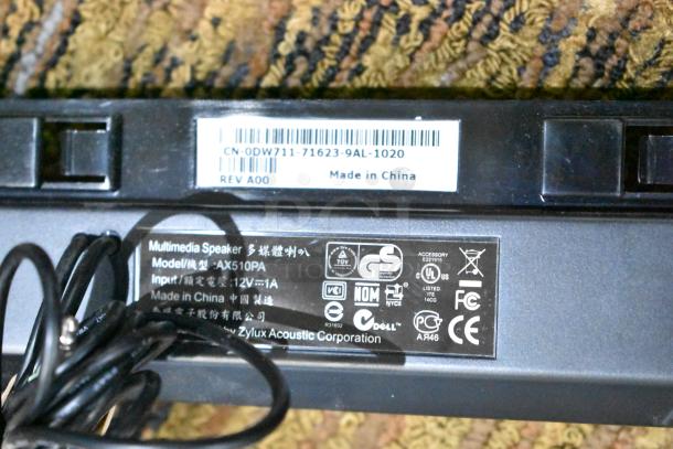 Multimedia Speaker Model AX510PA, labeled Made in China, 12V~1A input, Dell and Zylux logos visible.