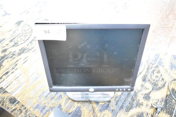 Two computer screens: Samsung S24R356FHN color display and Dell E172FPb. Bid doubles quantity. Power cord visible.