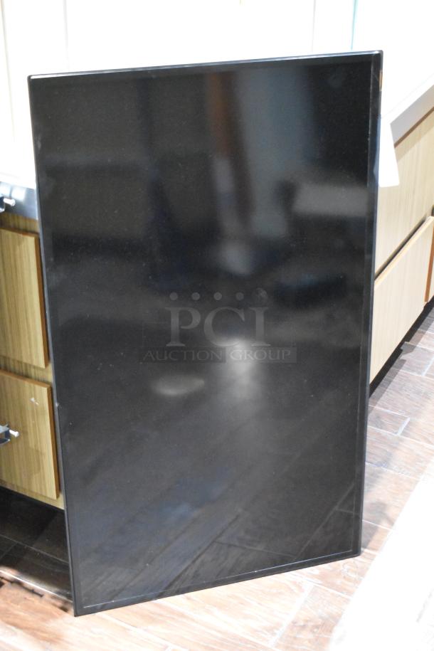 Samsung ME40C 40" TV displayed upright, black screen, no visible damage. Model: ME40C, 100-240V, buyer pick-up required.