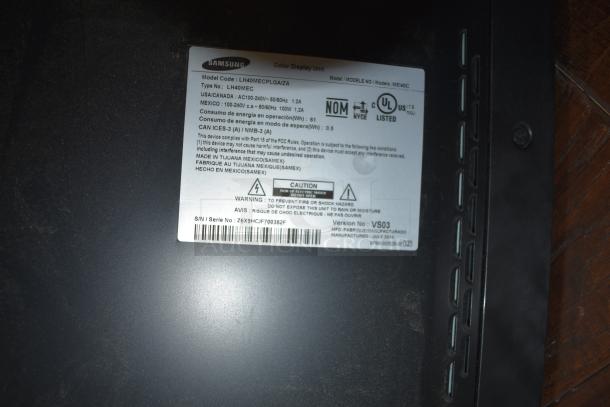 Samsung ME40C TV label with model, type, power details, and UL certification. Includes manufacturer info and safety warnings.