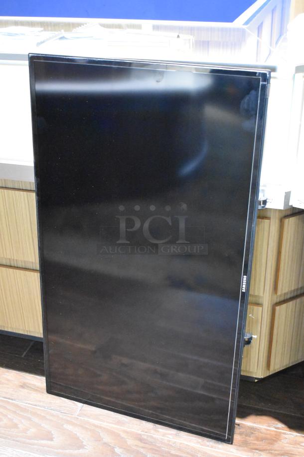 Samsung ME40C 40" television, black, good condition, energy rating 100-240V, for local pickup only.