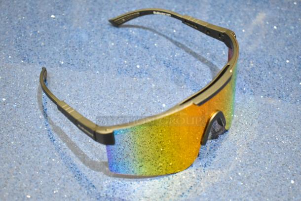 Brand new golden framed sunglasses with orange lenses, featuring a modern design and sleek finish.