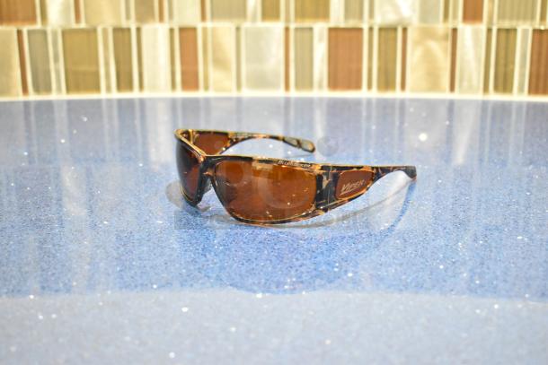 BRAND NEW Viper sunglasses with brown frame, BluBlocker lenses, Viper logo visible on the side.