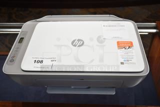 HP DeskJet 2755e printer, scanner, copier; countertop model; excellent condition; features visible: control panel, labels for Instant Ink subscription.