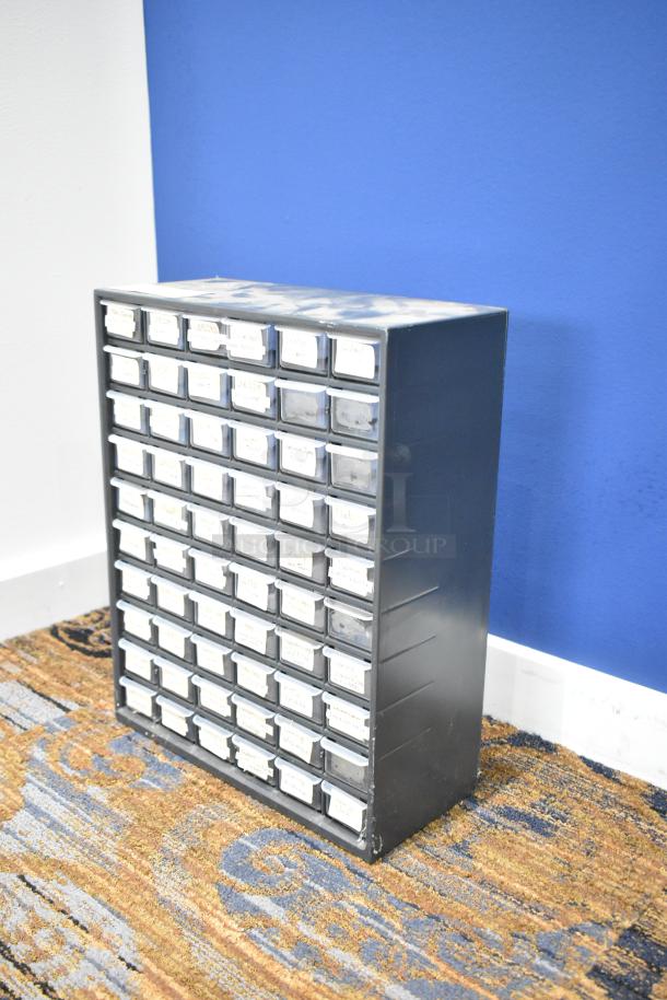 Countertop 60 Drawer Unit, metal frame, plastic drawers with labels, some wear on top, ideal for organized storage.