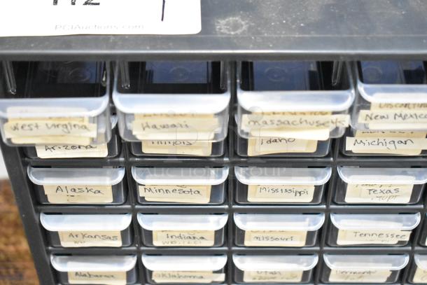 Countertop 60 Drawer Unit with labeled clear plastic drawers for organized storage; used for small items or hardware.