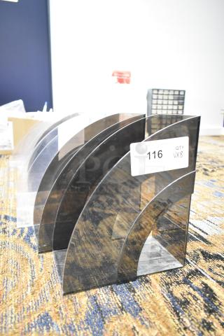 Eight black plastic magazine organizers, gently used, with label reading "116 QTY VX8." Great for office storage.