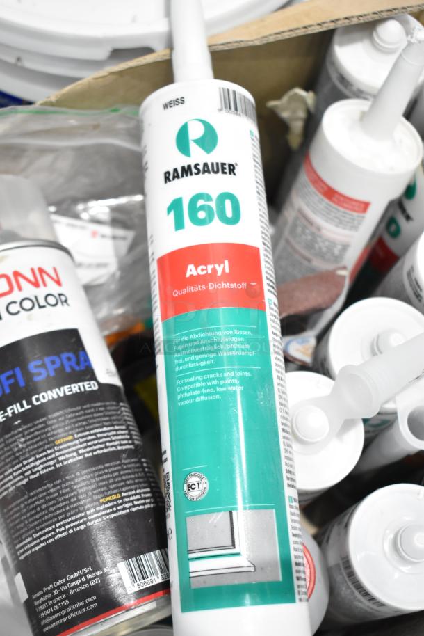 Box of 30 items including Ramsauer 160 Acryl sealant and Profi Spray cans, indicating variety in construction materials.