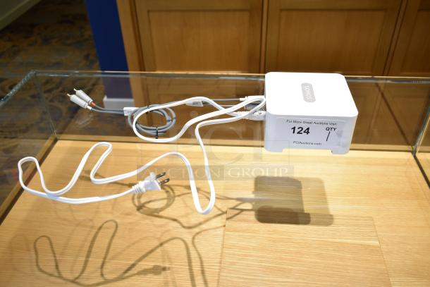 Sonos Connect Streaming device in excellent condition, includes power and audio cables, with visible label "124" for auction.