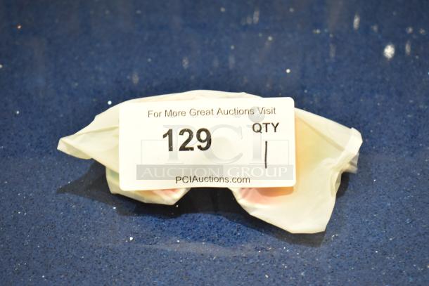 Brand new white framed sunglasses with BluBlocker orange lens, packaged with auction label marked "129" and "QTY 1".