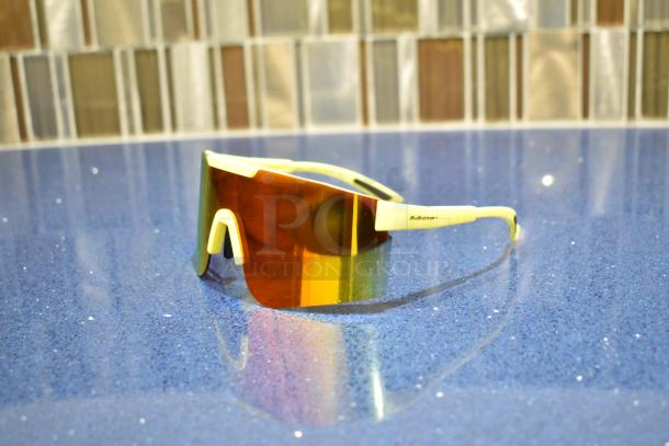 BRAND NEW yellow framed sunglasses with BluBlocker orange lens, signature logo on arm, modern wraparound design.