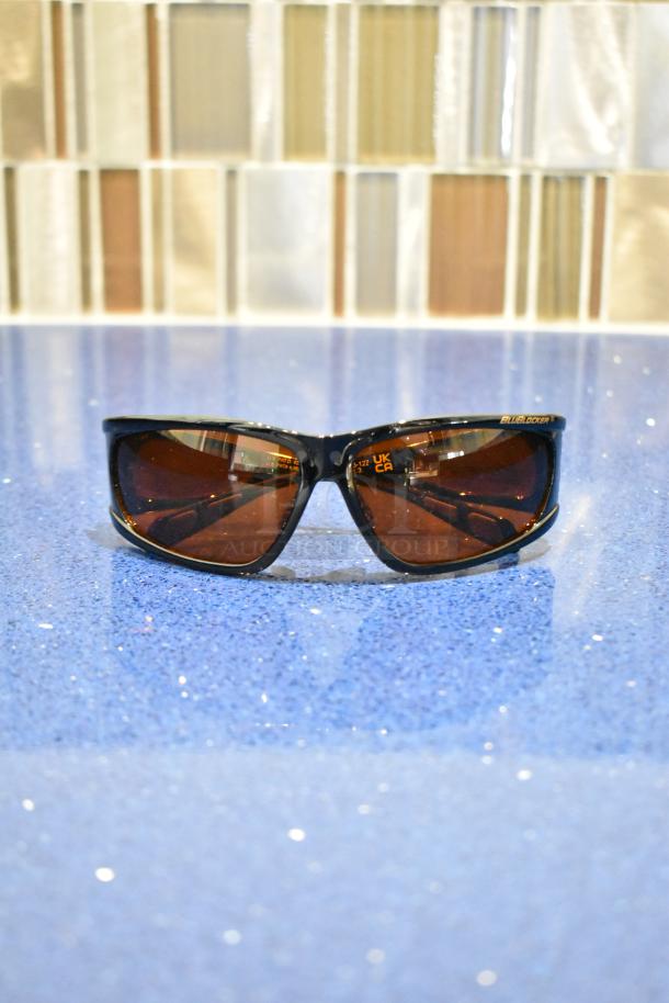 Viper black framed sunglasses with BluBlocker brown lenses, brand new condition, logo on frame.