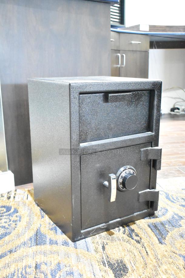 Black single compartment drop safe with combination lock. No combination provided. Solid condition, minor surface wear.