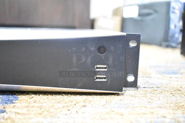 Hikvision DS-7716NXI-I4/16P/4S NVR rack unit, no hard drive, features two front USB ports, good condition.