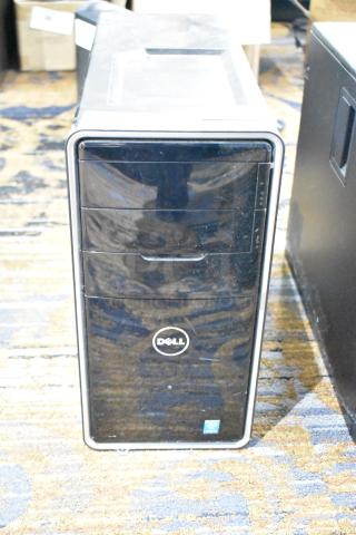 Dell computer tower, black front panel, Intel sticker, no hard drive, used condition, visible Dell logo.