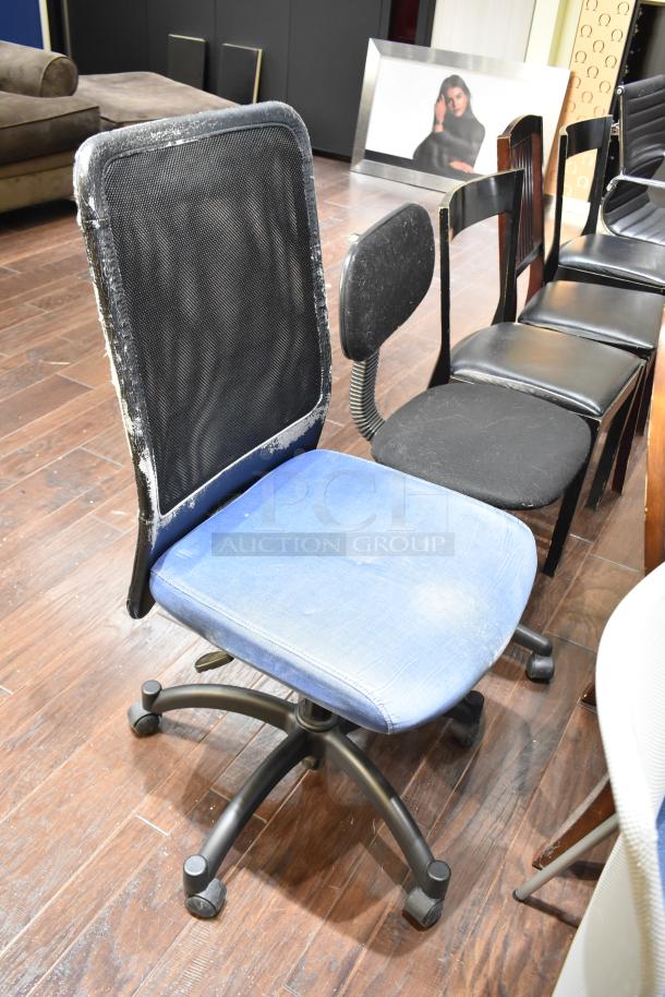 Thirteen assorted chairs, including gray Tolix-style dining chairs, floral armchair, office chair, and wooden armchair.