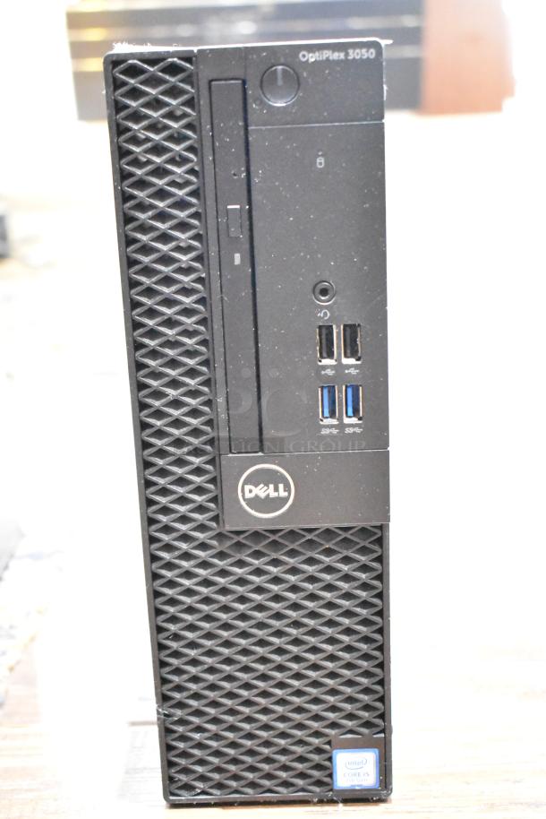 Dell Optiplex 3050 computer tower, missing hard drive, includes USB ports, vents, and Intel Core i5 label. Fair condition.