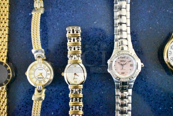 Lot of assorted watches and watch bands in clear poly bin, featuring Quarzt, Pulsar, and Seiko brands, varying conditions.