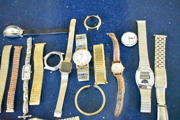 Collection of 32 watches and watch bands, various styles and conditions, including analog and digital designs.