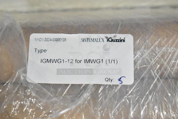 19 iGuzzini lights, including IGMWG1-12 model, wrapped in plastic. Label displays model and quantity details.