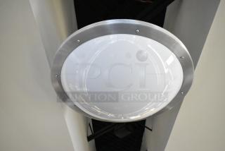 Ceiling mount light fixture with metal trim and frosted glass. Sold in a lot of five; buyer responsible for removal.