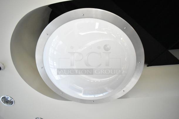Modern ceiling mount light with a metal rim and white dome. Sold in a lot of five, requires removal by buyer.