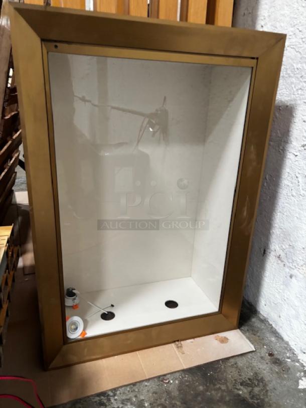 Double-sided wall pop out case, 27.5x39.25 inches per side, gold frame, good condition. Available for pickup in Lancaster, PA.