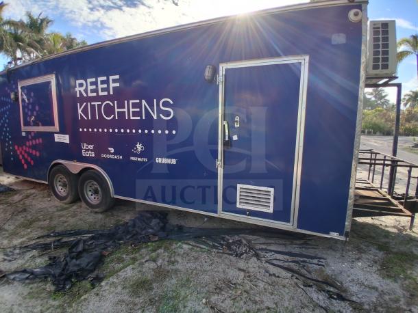Food trailer with grease hood system, featuring Royal Range, Avantco griddle, gas fryer, and four-unit refrigeration package.