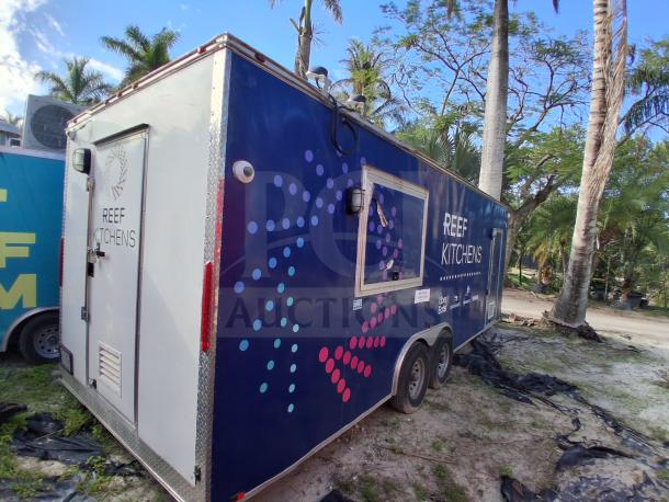 Food trailer featuring grease hood system, Royal Range, Avantco griddle, gas fryer, and four-unit refrigeration.