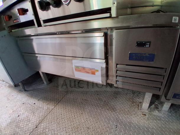 Commercial kitchen trailer includes grease hood, Dean fryers, Sierra griddle, Wells cooktop, Arctic Air refrigeration.