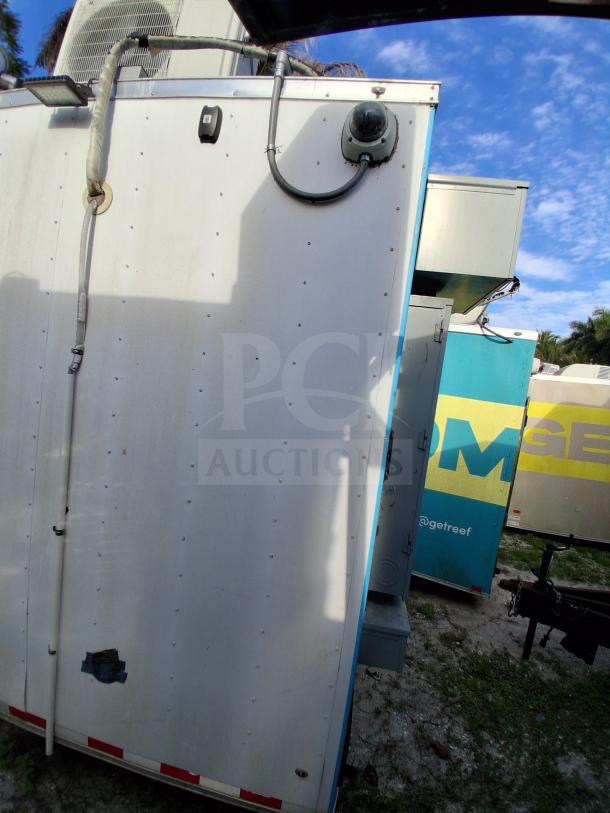 Commercial kitchen trailer exterior, includes grease hood, Dean fryers, Sierra griddle, Wells cooktop, and Arctic Air refrigeration.