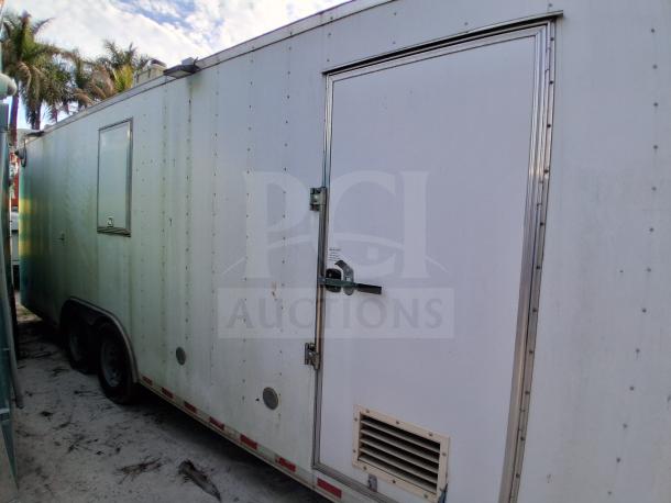 Commercial kitchen trailer featuring grease hood, Dean fryers, Sierra griddle, Wells cooktop, and Arctic Air refrigeration.