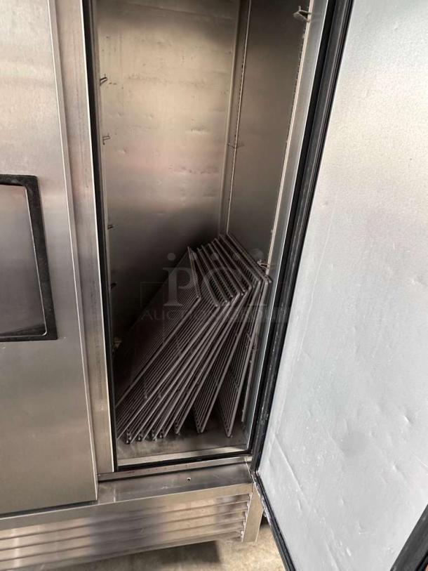 True T-35-HC stainless steel reach-in refrigerator, 39.5", solid doors, excellent condition, tested, includes shelving.