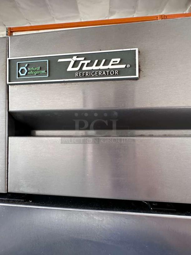 Prime condition True T-35-HC refrigerator, stainless steel, 39.5", two solid doors, 115V, fully tested, branded label visible.