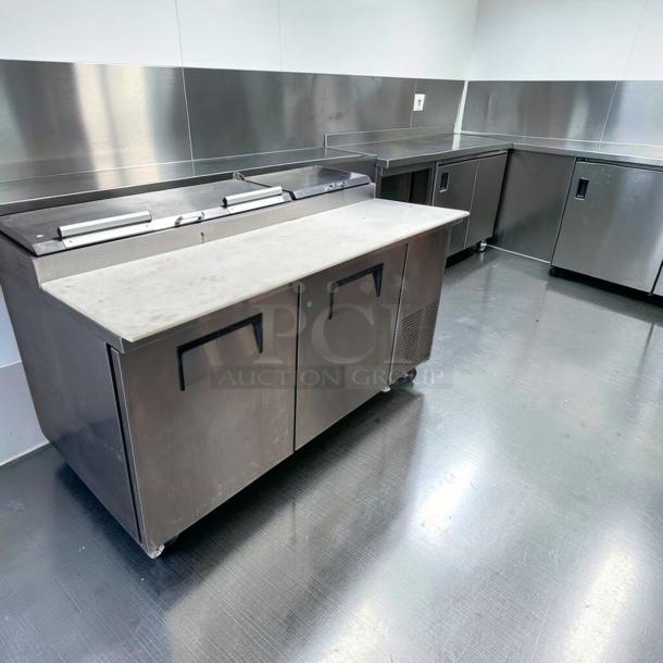 Outstanding condition True TPP-AT-67-HC pizza prep table refrigerator, marble top, 2-door refrigerated base, fully tested.