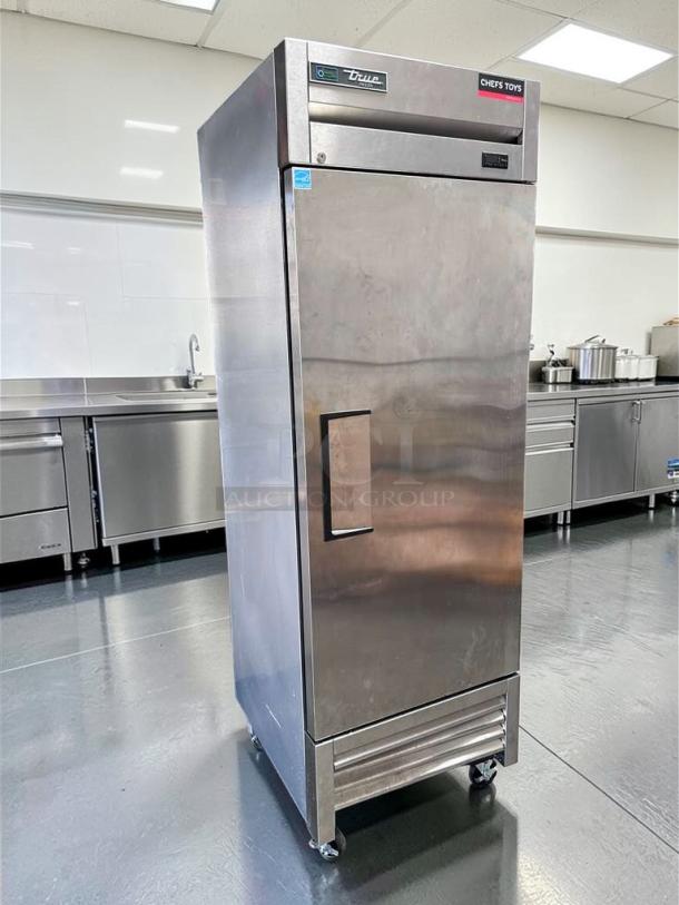 Alt Text: True T-23F-HC 23 Cu. Ft. stainless steel reach-in freezer, flawless condition, commercial grade, fully tested and operational.