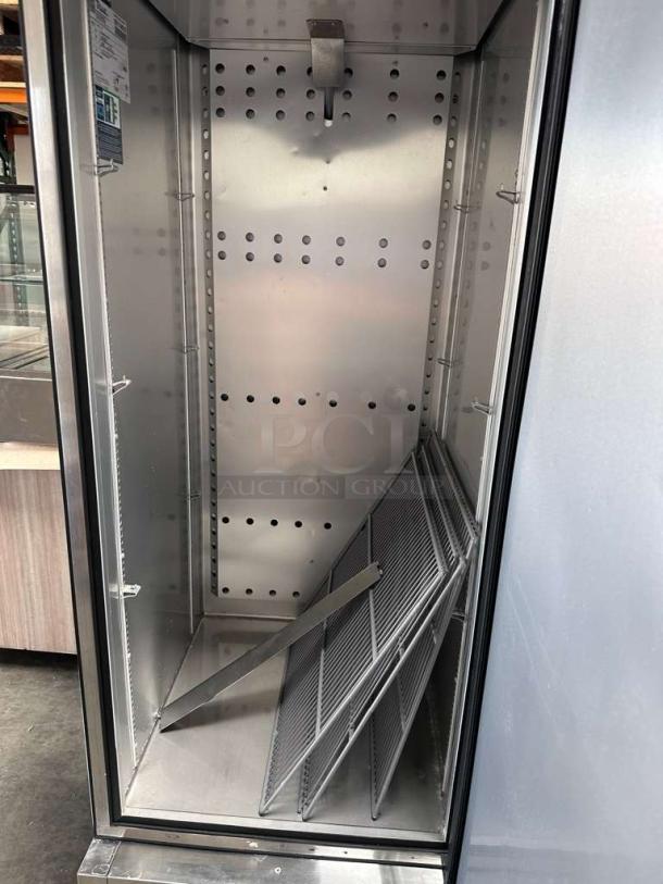 True T-23F-HC reach-in freezer, 23 Cu. Ft., stainless steel, flawless condition, commercial-grade, fully operational.