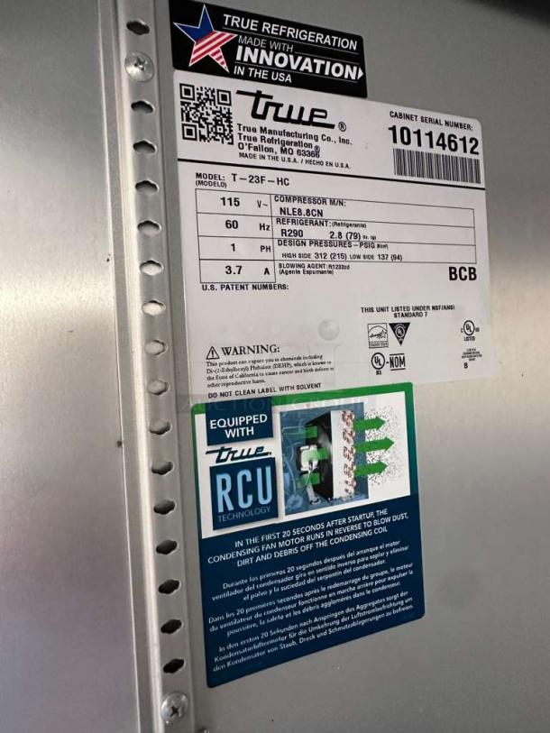 Flawless True T-23F-HC reach-in freezer, 23 cu. ft., commercial grade, stainless steel, 115V, fully tested, labels detail specs.