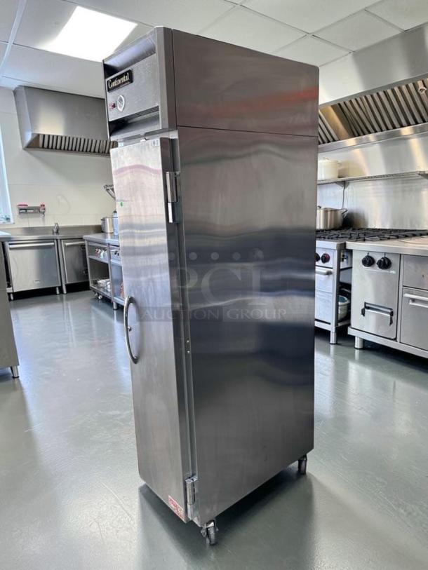 Superior condition Continental Refrigerator 1RSE-N, 18" narrow reach-in, stainless steel finish, fully tested, model tag visible.