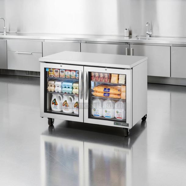 True TUC-48G-HC 48" undercounter refrigerator in stainless steel with two glass doors, fully tested and operational.