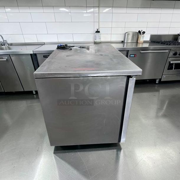 True TUC-48G-HC 48" undercounter refrigerator, stainless steel, 2 glass doors, excellent condition. Fully tested, operational.
