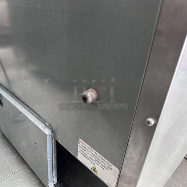 True TUC-48G-HC undercounter refrigerator, stainless steel, 48", with glass doors, exceptional condition, fully tested.