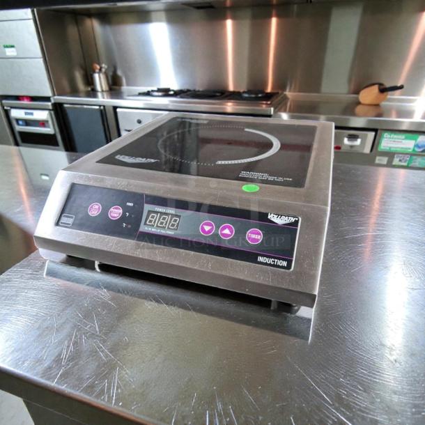 Elite condition Vollrath 6954301 countertop induction range, 240V, digital controls, fully tested, commercial-grade cooker.