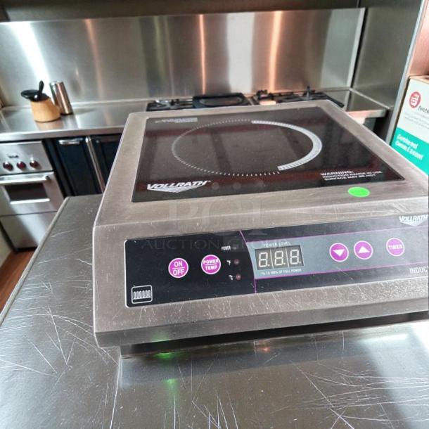 Elite condition Vollrath 6954301 induction range, stainless steel, digital controls, fully tested, commercial-grade cooker.