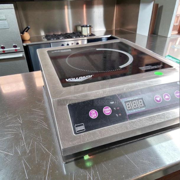 Vollrath 6954301 induction range, stainless steel, digital display, elite condition, tested, 240V commercial cooker.