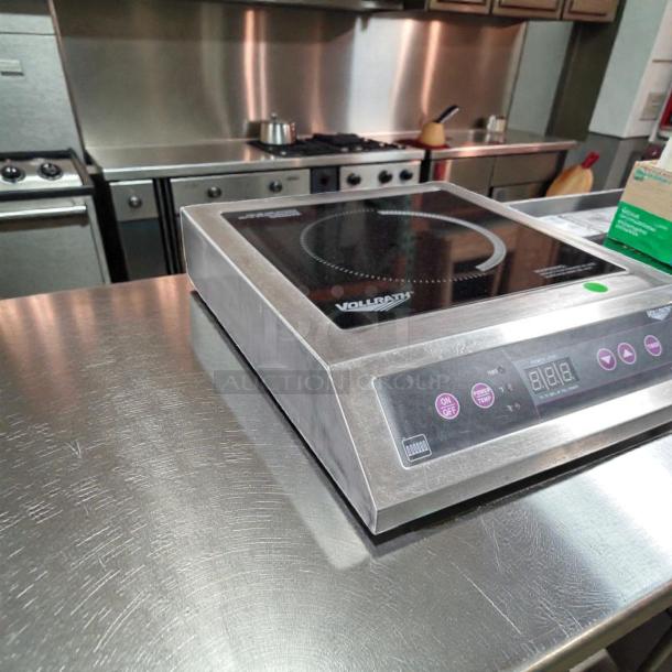 Elite condition Vollrath 6954301 induction range on countertop, digital display, operational, commercial-grade, 240V.