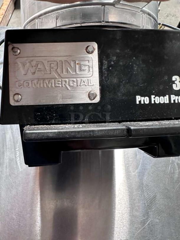 Waring Commercial WFP14S food processor, pristine condition, 3.5 Qt bowl, heavy-duty, vibrant brand plate, fully tested.