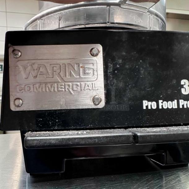 Waring WFP14S commercial food processor, 3.5 Qt bowl, pristine condition, heavy-duty, 120V, metal Waring logo.